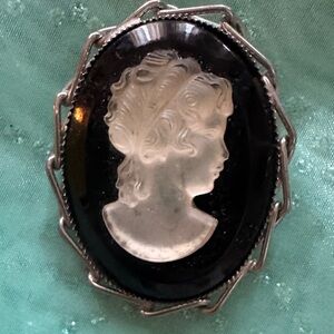 Elegant Black and Silver Cameo Brooch